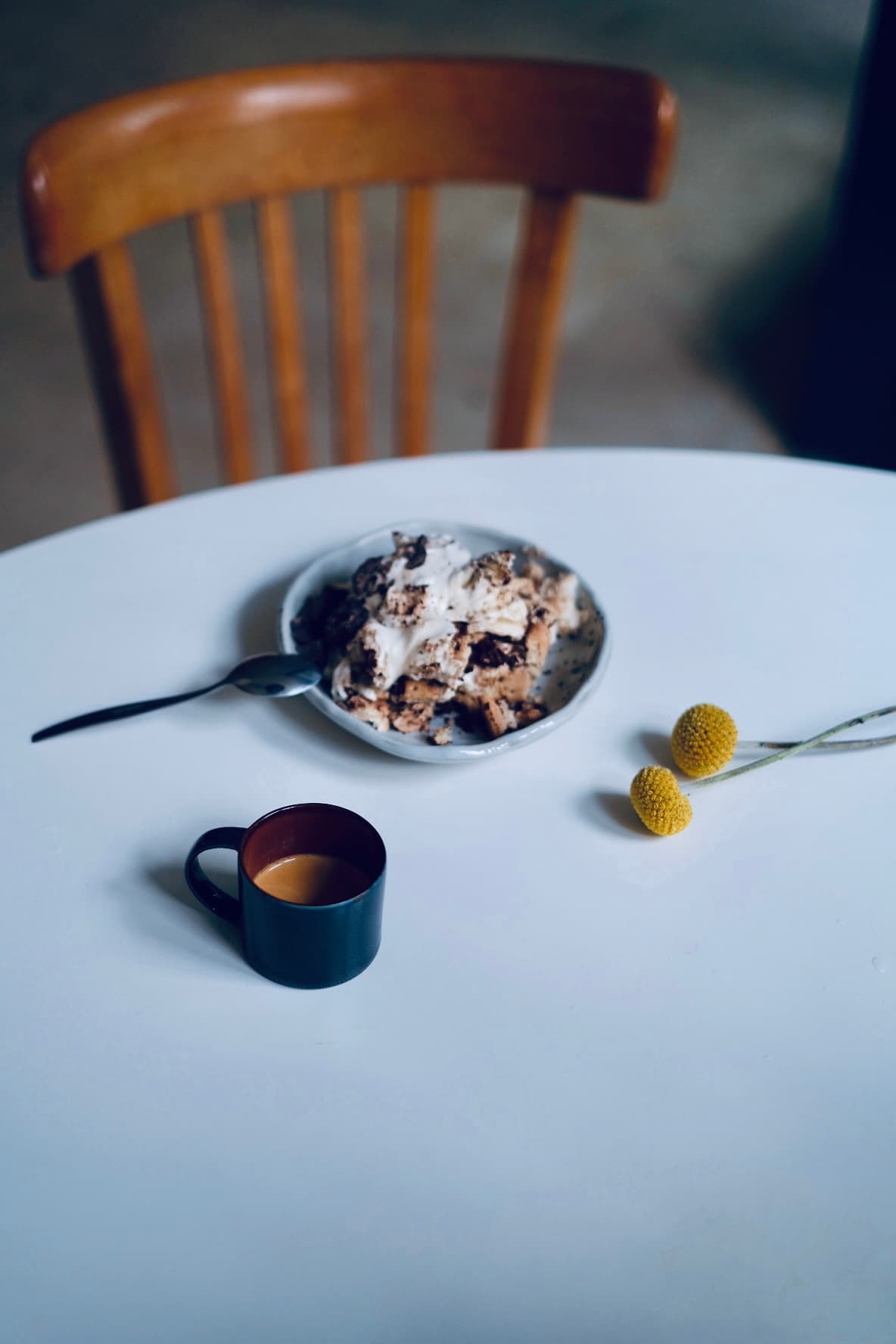 Coco Anjela dessert and espresso arranged on a white event table