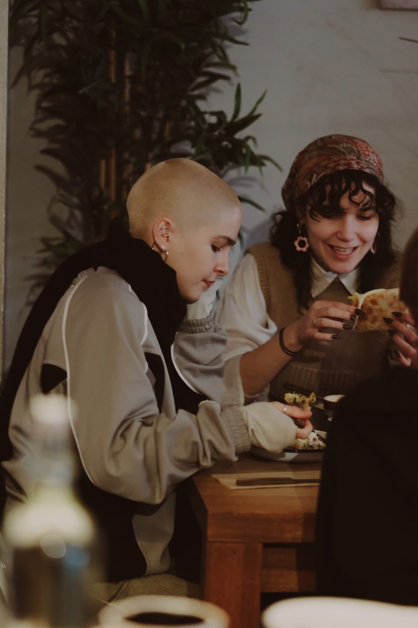 Guests sharing dessert and conversation during an intimate evening at Factory Girl