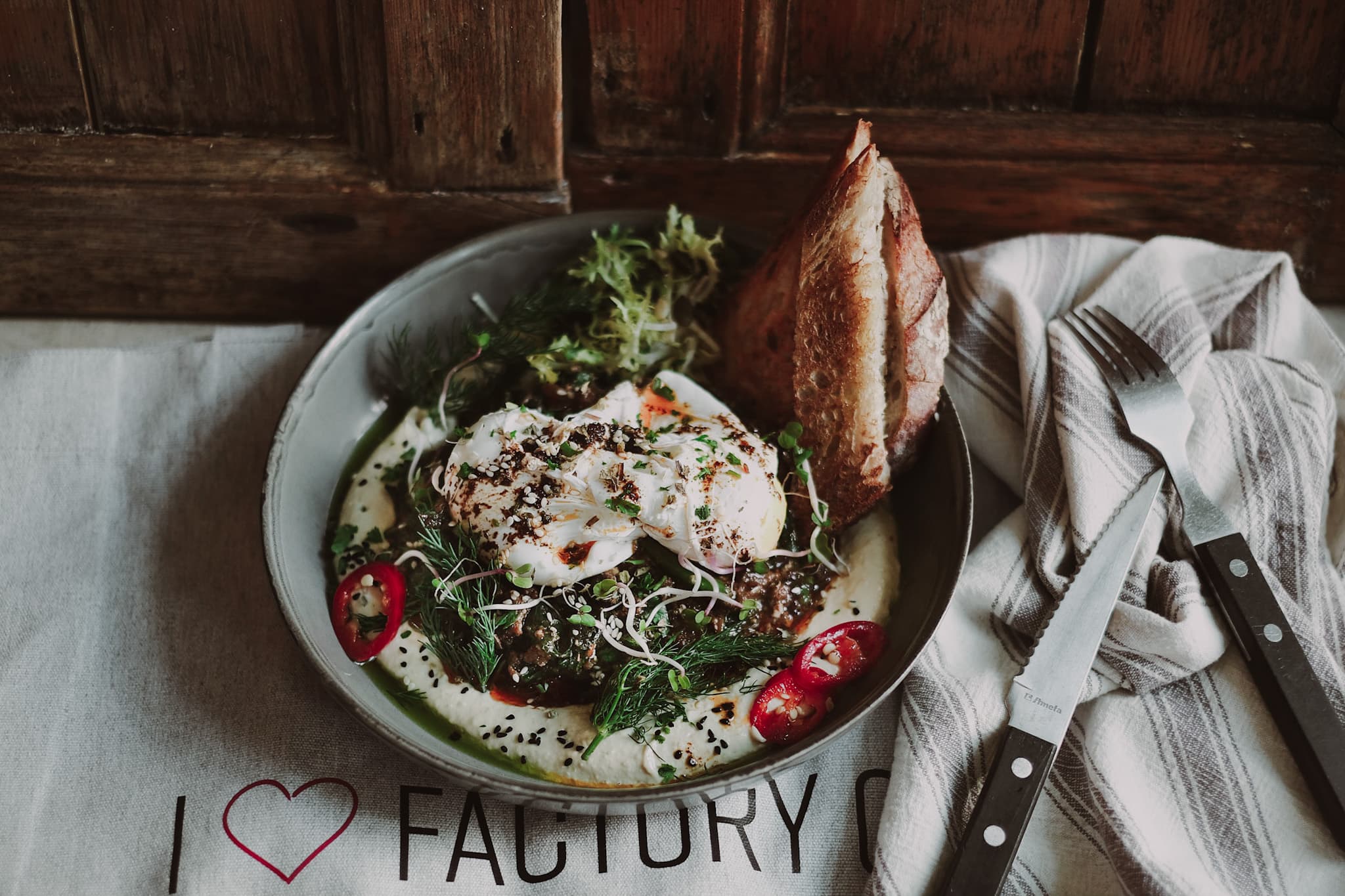 Turk's Dad with hummus base, sucuk and eggs