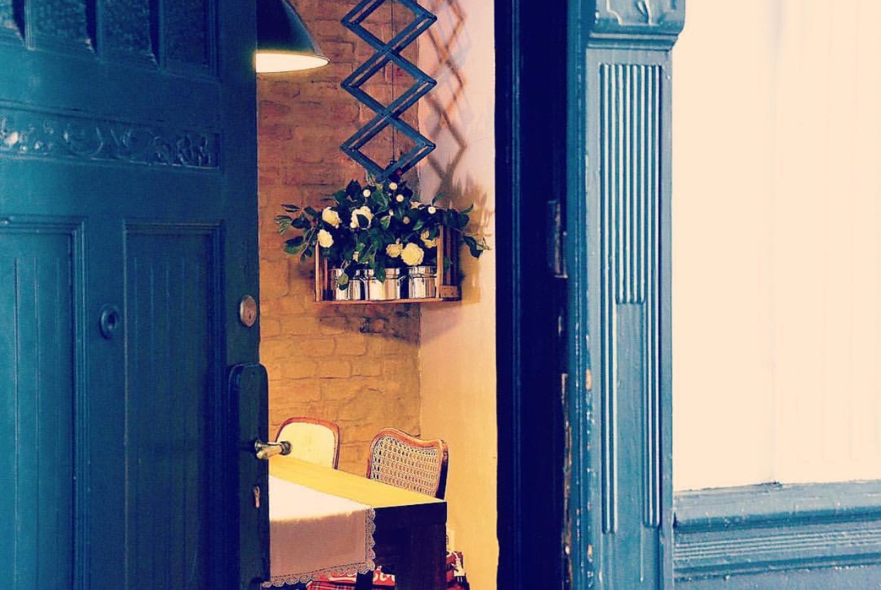 Factory Girl dining room framed through the entrance